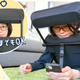 A woman with glasses uses the cushion.